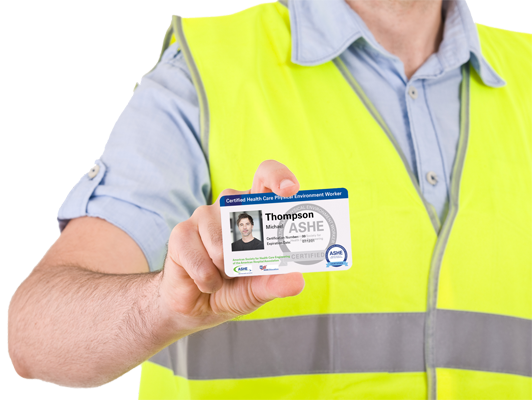 ASHE worker holding ID